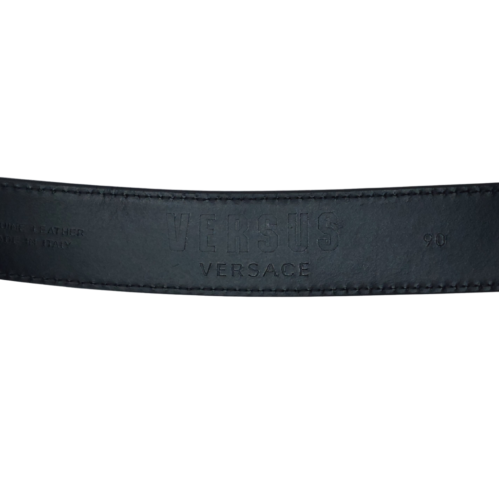 Black Versace belt with silver lion buckle